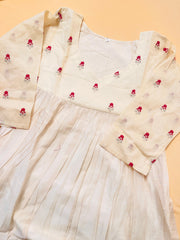 Off white small magenta flowers top