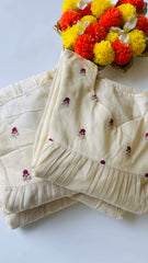 Off white small magenta flowers top