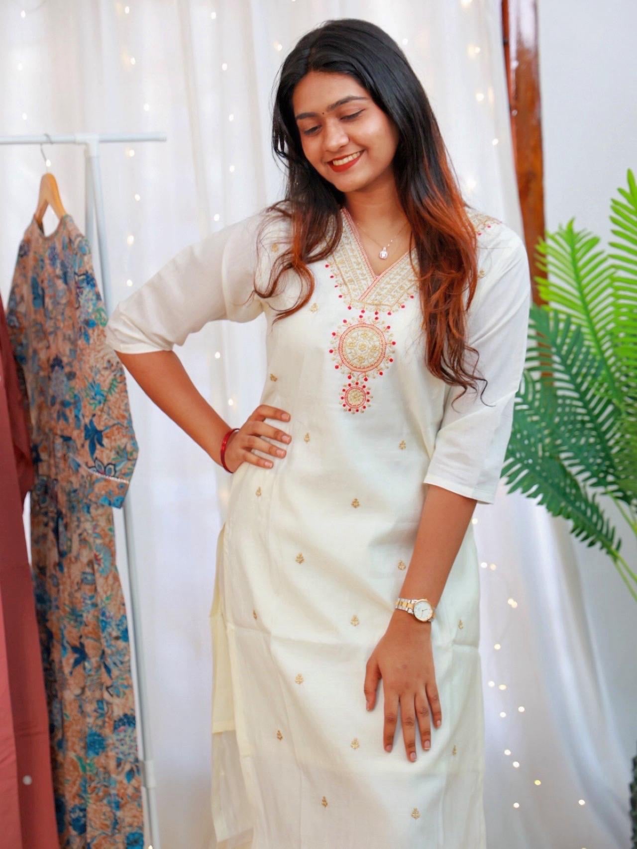 Off white salwar set with jewel neck