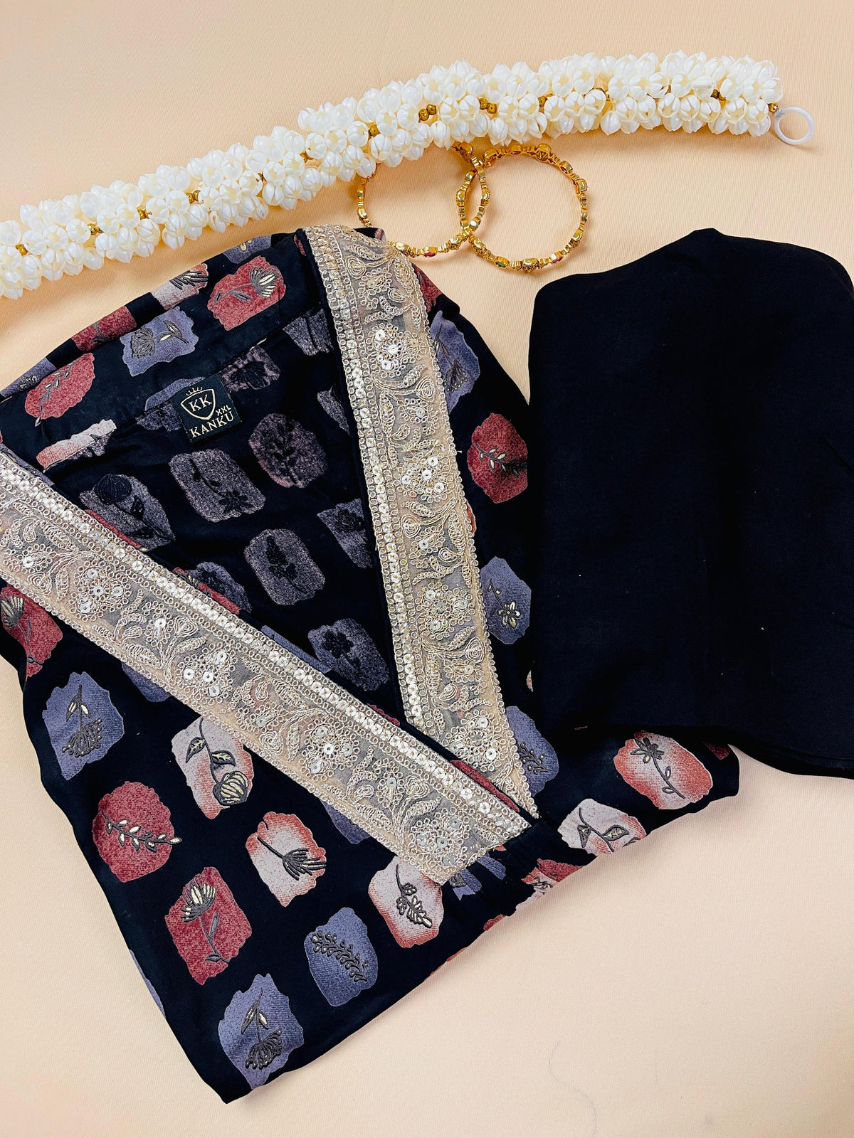 Black kurtha with golden V neck
