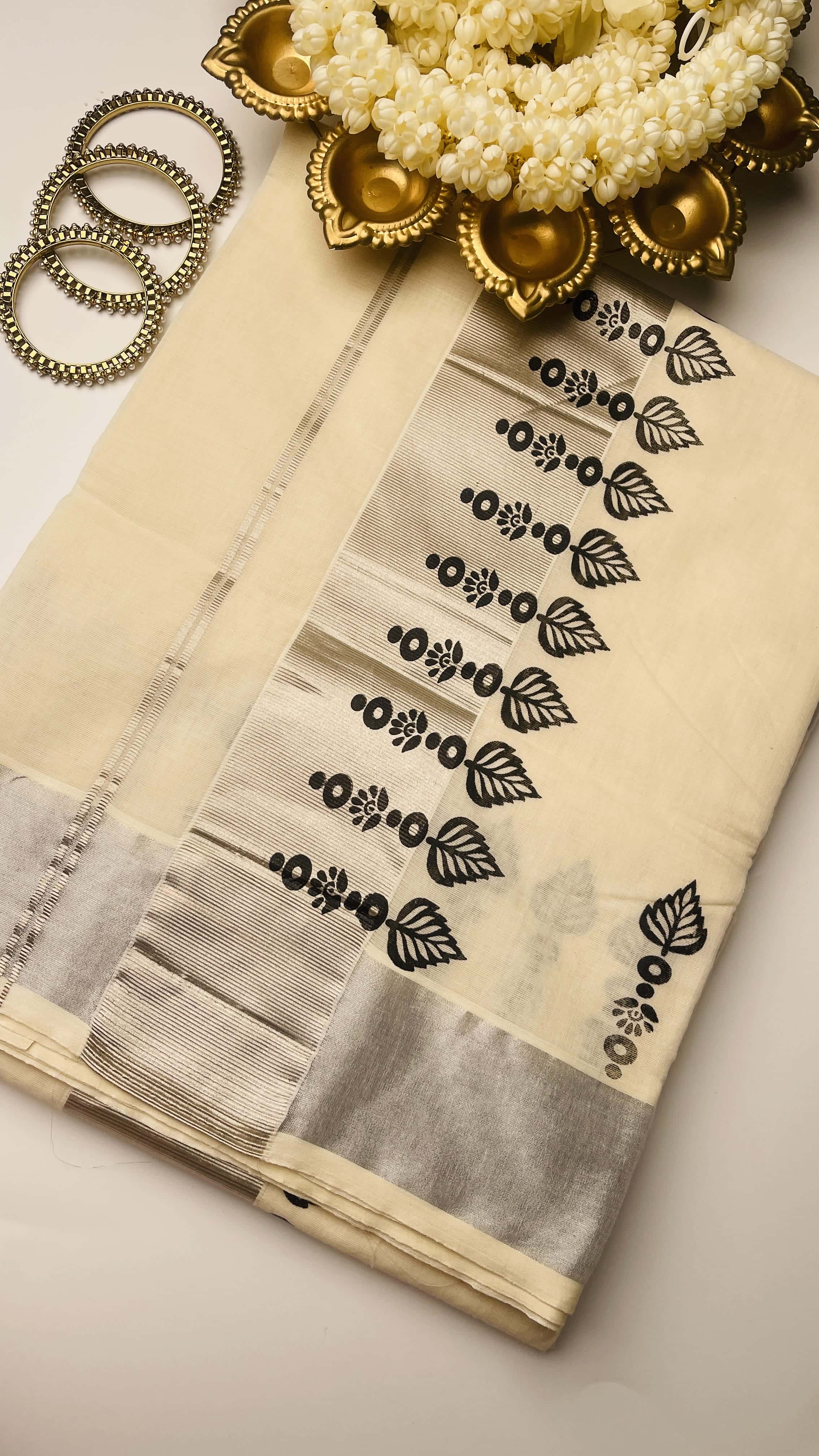 Black block print silver border saree