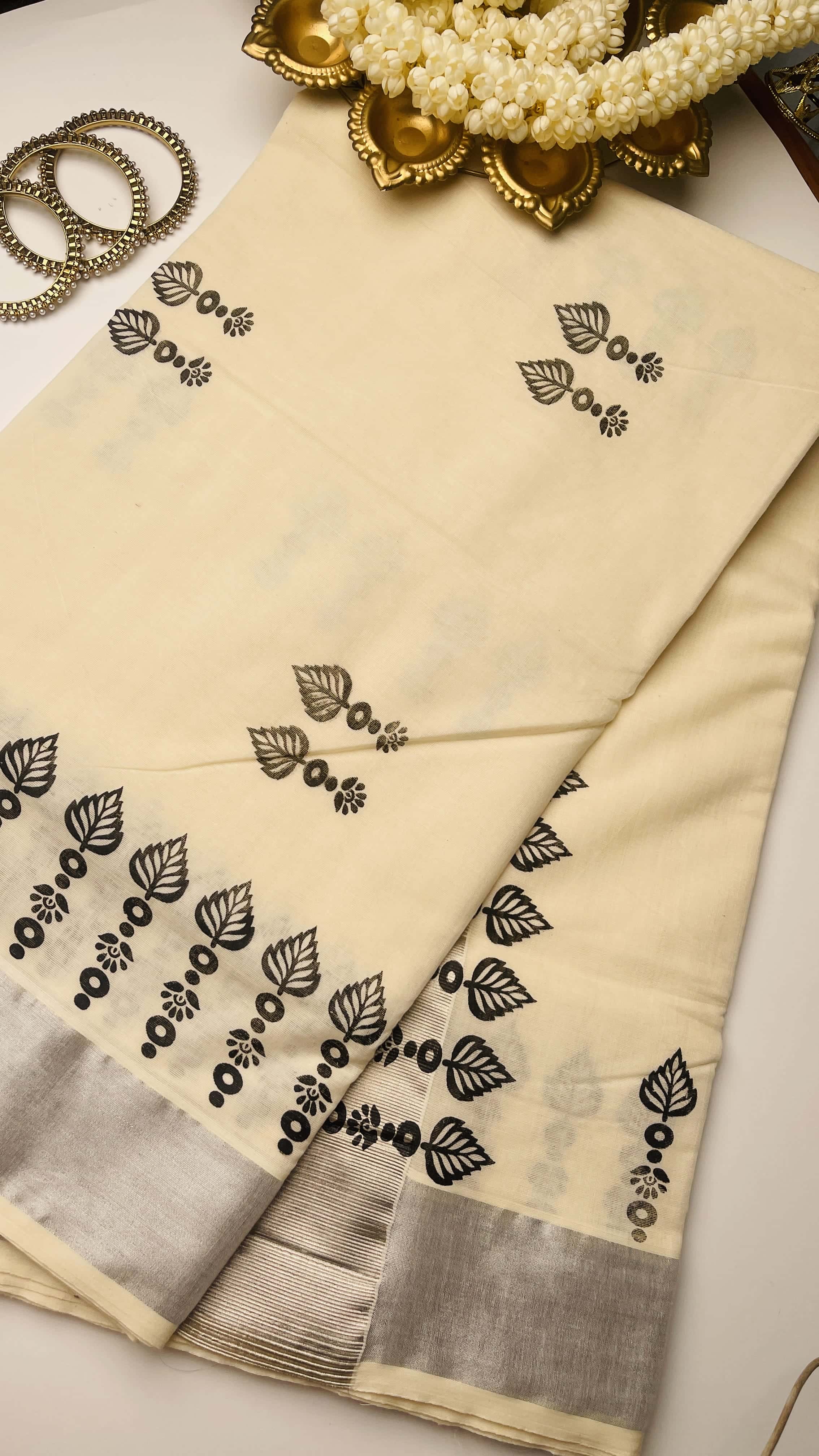 Black block print silver border saree