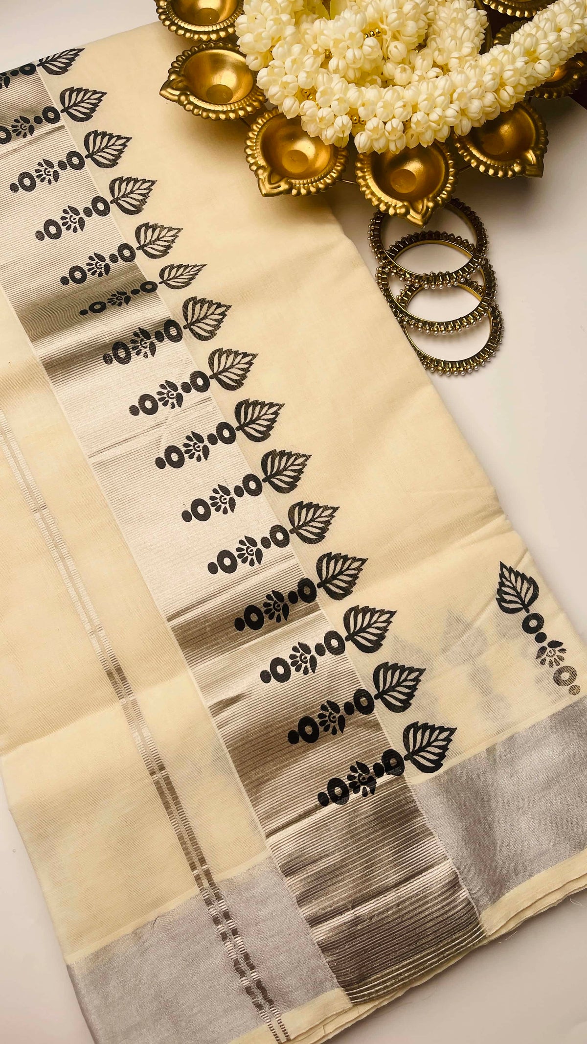 Black block print silver border saree