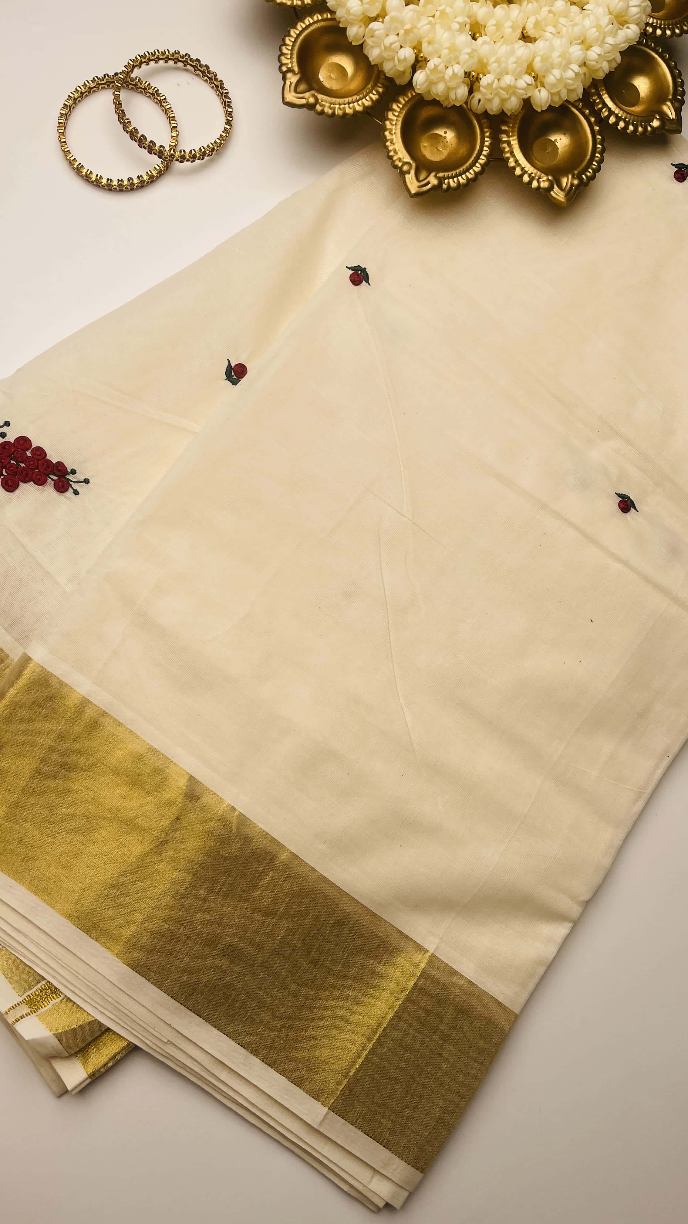 Swarna Mundiri  saree