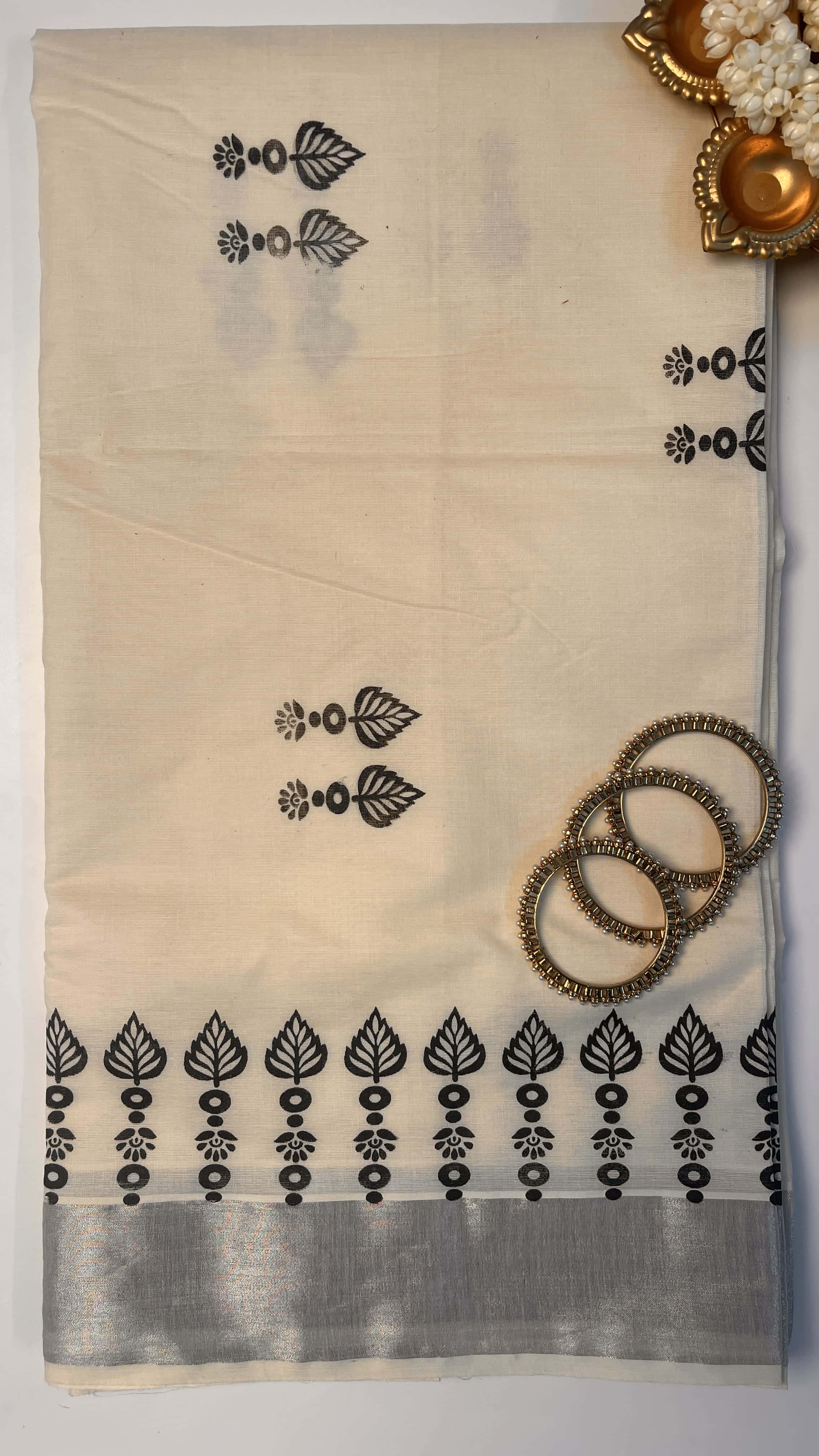 Black block print silver border saree