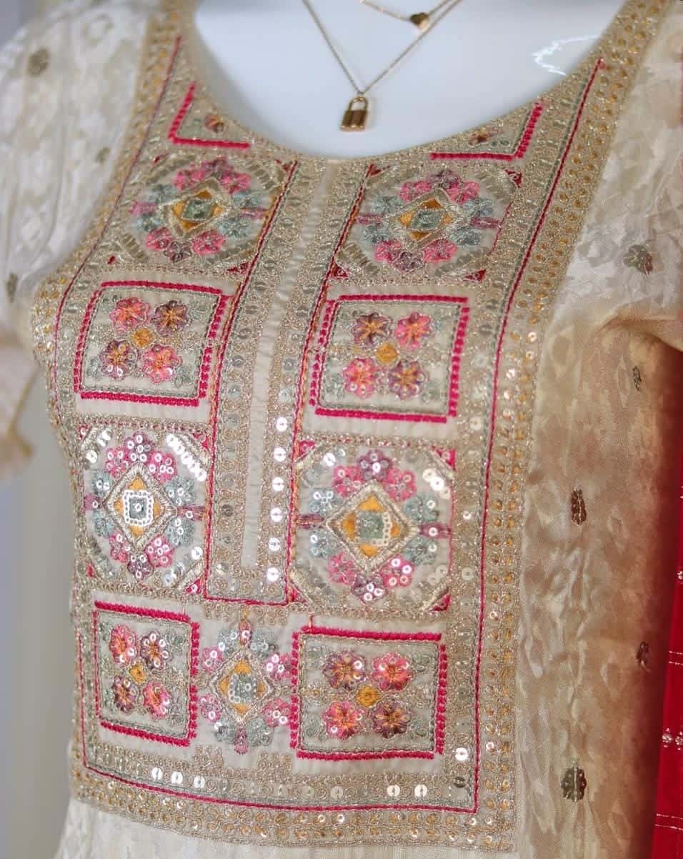Cream premium salwar suit with Rani pink dupetta