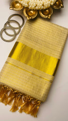 Check saree with golden tassels